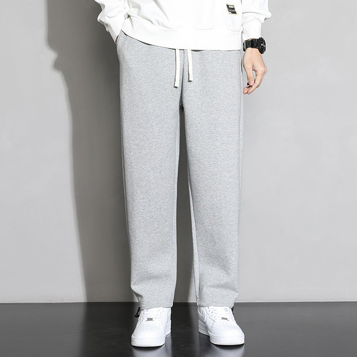 Herrarnas fritids-joggingbyxor med elastisk midja och sidofickor med dragkedja Mirla-Eva Jonsson