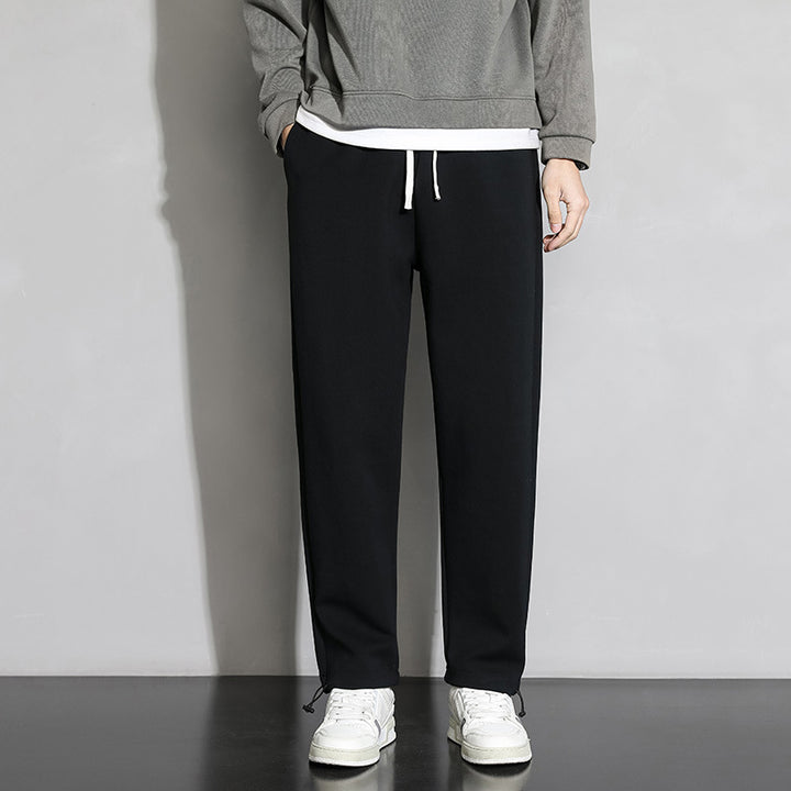 Herrarnas fritids-joggingbyxor med elastisk midja och sidofickor med dragkedja Mirla-Eva Jonsson