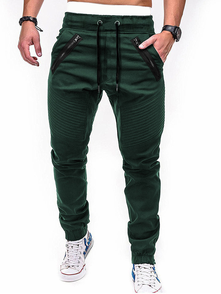 Herrarnas fritids joggingbyxor med kontrasterande dragkedjefickor och elastisk midja Mirla-Eva Jonsson
