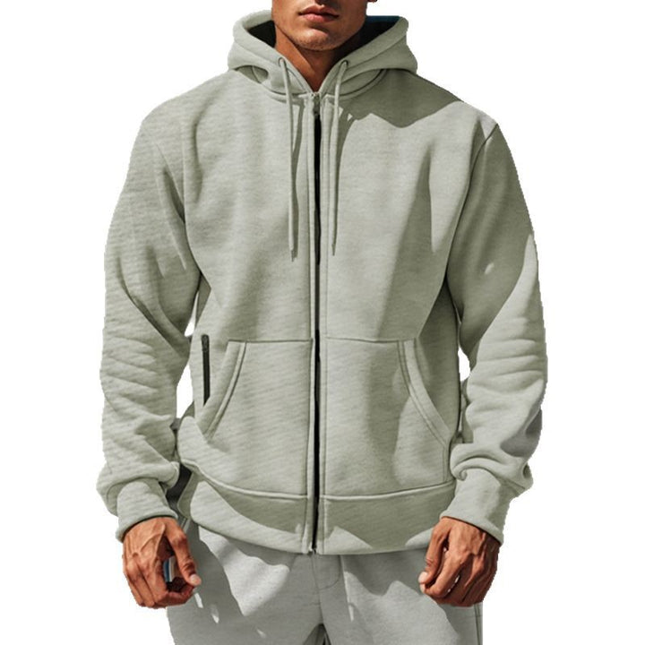 Herrarnas hoodie med praktiska dragkedjefickor och innovativt innerlager Mirla-Eva Jonsson