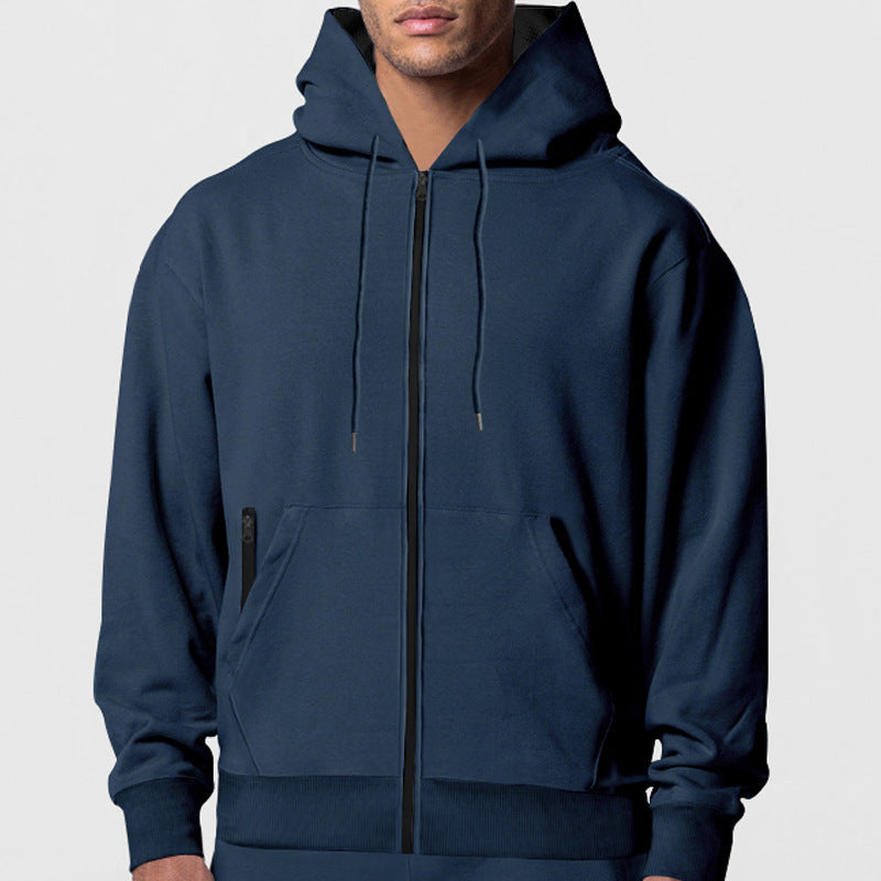 Herrarnas hoodie med praktiska dragkedjefickor och innovativt innerlager Mirla-Eva Jonsson