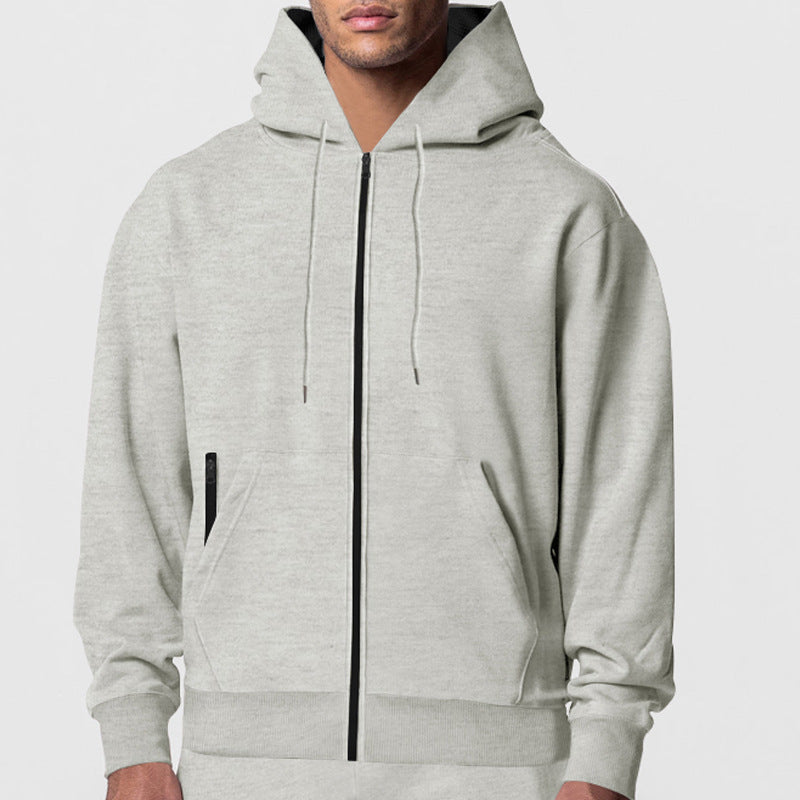 Herrarnas hoodie med praktiska dragkedjefickor och innovativt innerlager Mirla-Eva Jonsson