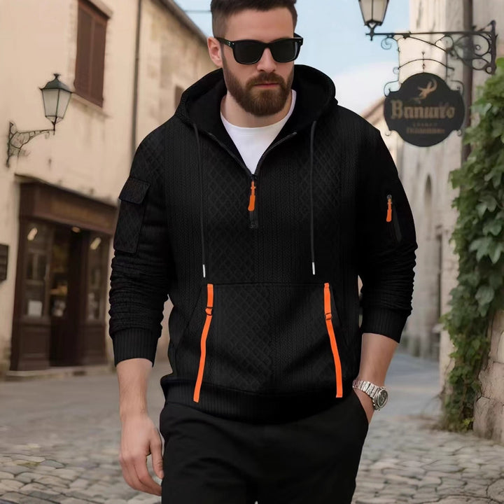 Herrarnas mode hoodie med strukturerad design och praktiska fickor Mirla-Eva Jonsson