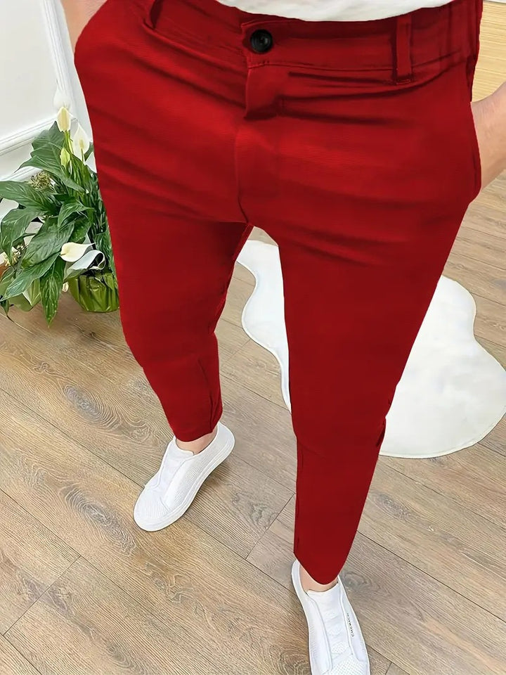 Herrarnas modiska slim-fit byxor med elastisk midja och praktiska fickor Mirla-Eva Jonsson