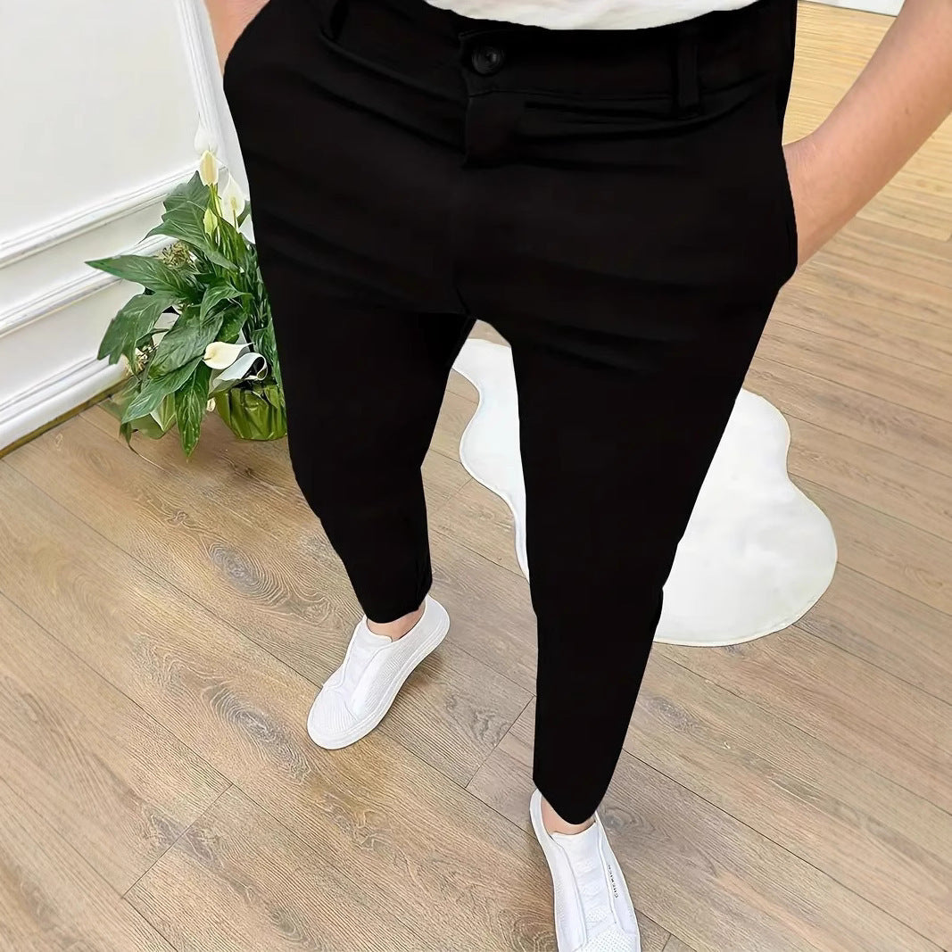 Herrarnas modiska slim-fit byxor med elastisk midja och praktiska fickor Mirla-Eva Jonsson