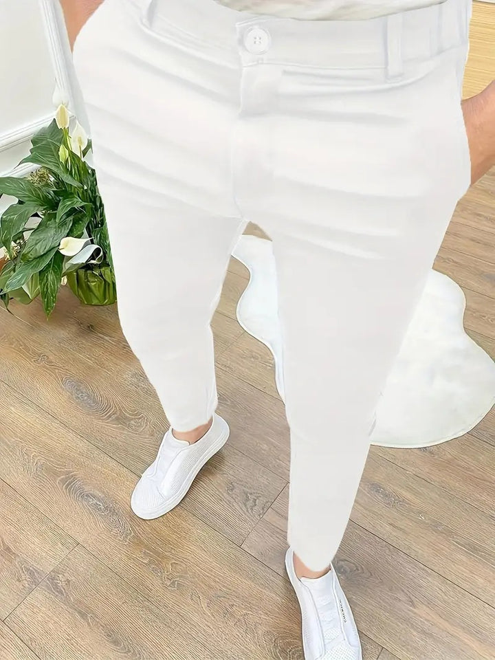 Herrarnas modiska slim-fit byxor med elastisk midja och praktiska fickor Mirla-Eva Jonsson