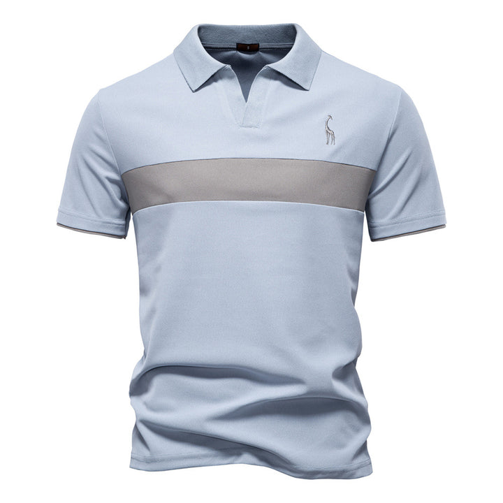 Herrarnas poloshirt med modern blockdesign och högkvalitativ bomullsblandning Mirla-Eva Jonsson