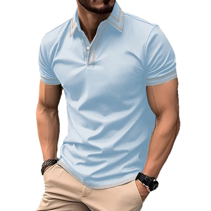 Herrarnas poloshirt med modern kontrastkrage och andningsbart material Mirla-Eva Jonsson