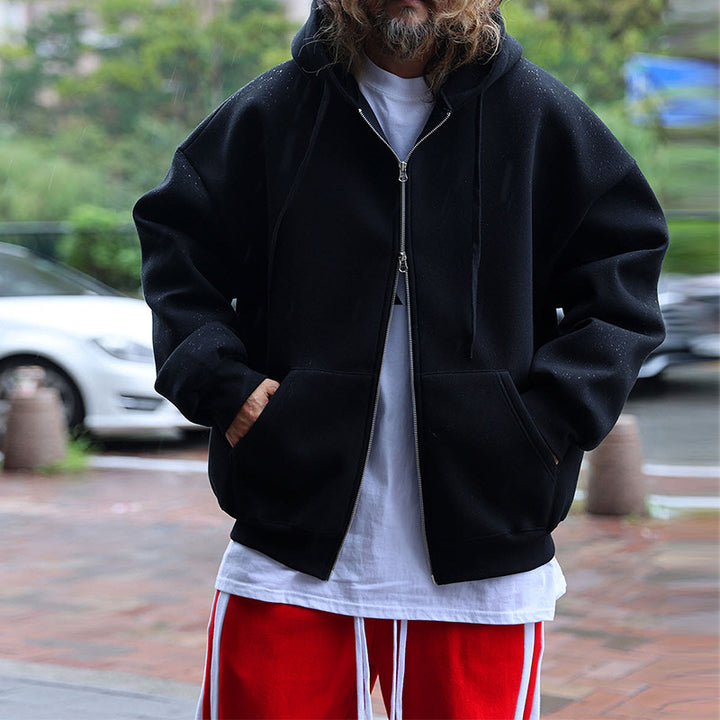 Herrarnas quiltad oversized hoodie med innovativa fickor Mirla-Eva Jonsson