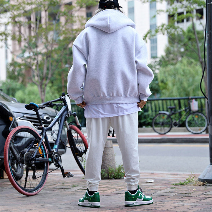 Herrarnas quiltad oversized hoodie med innovativa fickor Mirla-Eva Jonsson