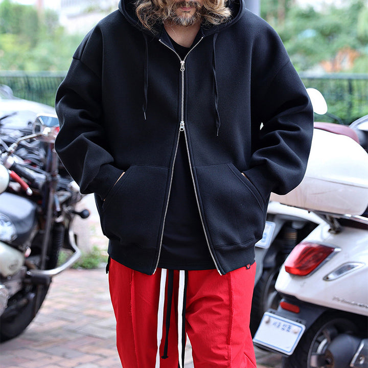 Herrarnas quiltad oversized hoodie med innovativa fickor Mirla-Eva Jonsson