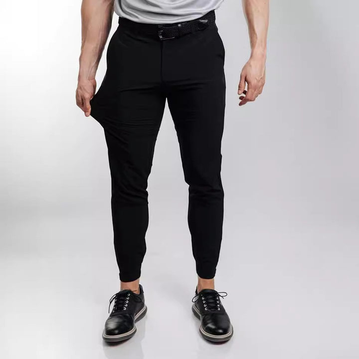 Herrarnas slim-fit kostymbyxor med elastisk midja och praktisk ficklayout Mirla-Eva Jonsson