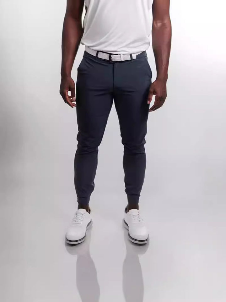 Herrarnas slim-fit kostymbyxor med elastisk midja och praktisk ficklayout Mirla-Eva Jonsson
