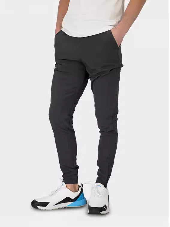 Herrarnas slim-fit kostymbyxor med elastisk midja och praktisk ficklayout Mirla-Eva Jonsson