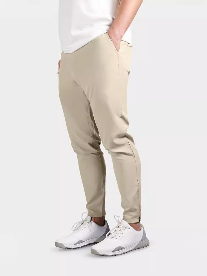 Herrarnas slim-fit kostymbyxor med elastisk midja och praktisk ficklayout Mirla-Eva Jonsson
