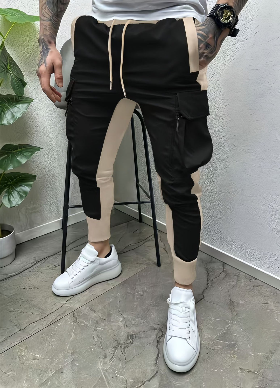Herrarnas sportiga cargo-joggingbyxor med multifunktionella fickor och elastisk midja Mirla-Eva Jonsson