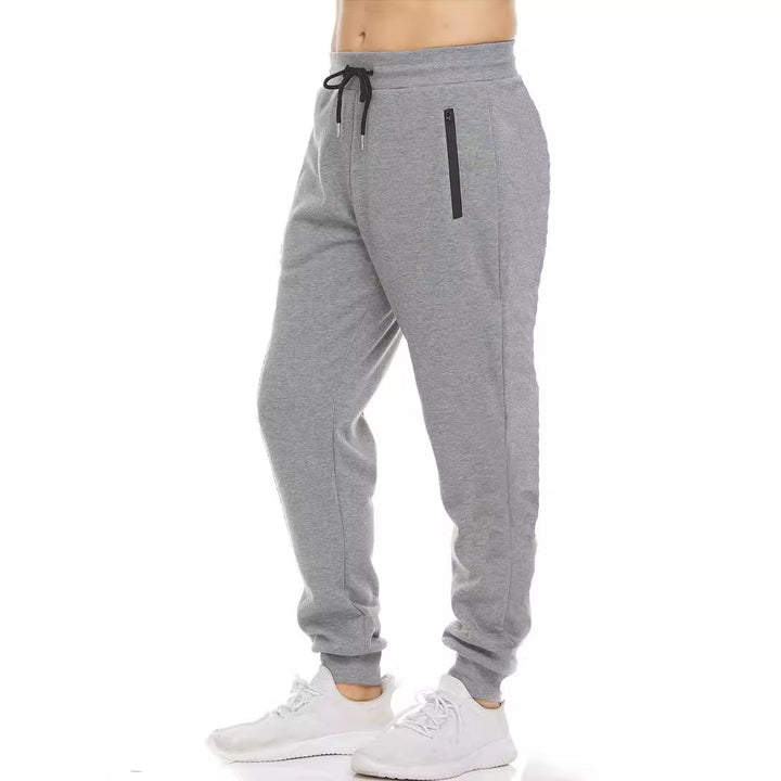 Herrarnas sportiga joggingsbyxor med praktiska fickor och elastisk midja Mirla-Eva Jonsson