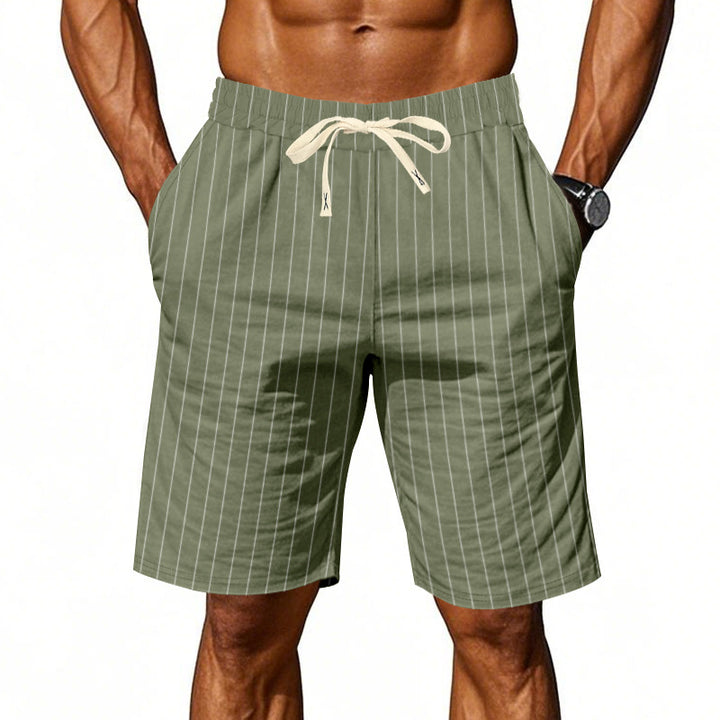Herrarnas strandshorts med vertikalt randmönster och elastisk dragsko Mirla-Eva Jonsson