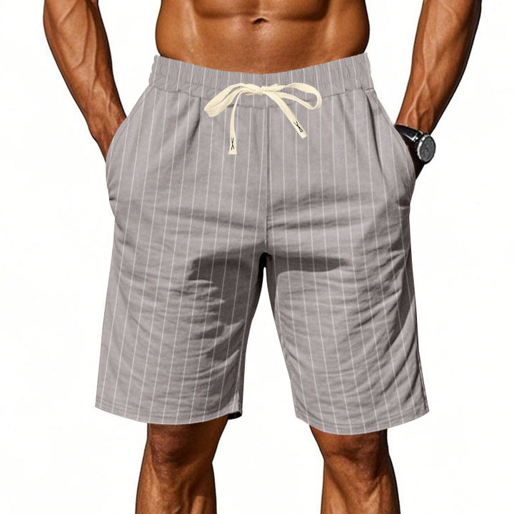 Herrarnas strandshorts med vertikalt randmönster och elastisk dragsko Mirla-Eva Jonsson