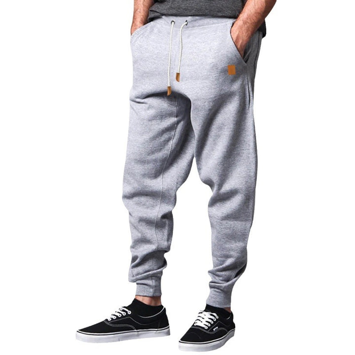 Herrarnas trendiga fritids-joggingbyxor med elastisk midja och praktiska fickor Mirla-Eva Jonsson