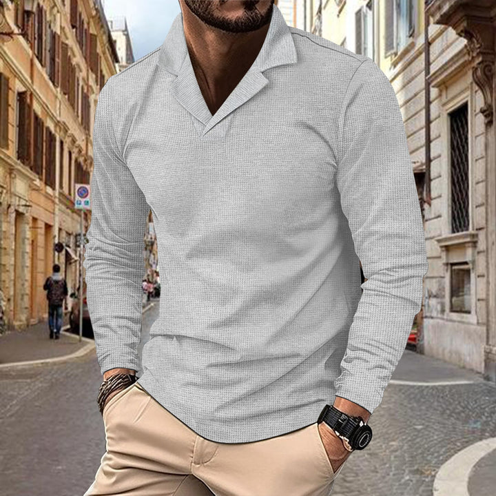 Herren avslappnad långärmad polo med strukturerad design Mirla-Eva Jonsson