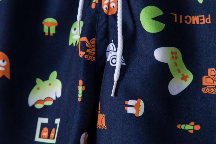 Herren badshorts i lekfull grafikdesign med elastisk midja och dragkedja Mirla-Eva Jonsson