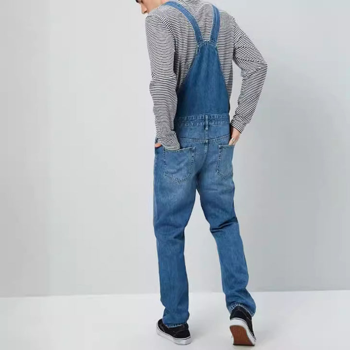 Herren denim hängselbyxor i vintage-stil med justerbara bälten och praktiska fickor Mirla-Eva Jonsson