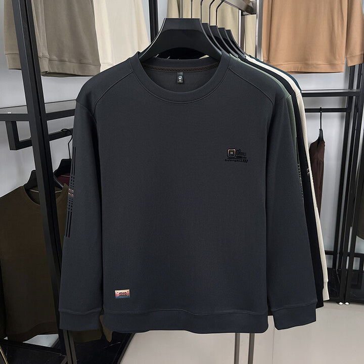 Herren långärmad sweatshirt med strukturerad väv och stiligt logotyp Mirla-Eva Jonsson