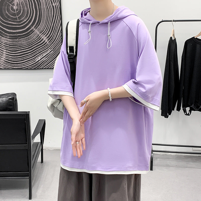 Herren oversize T-shirt med huva och ventilerande egenskaper Mirla-Eva Jonsson