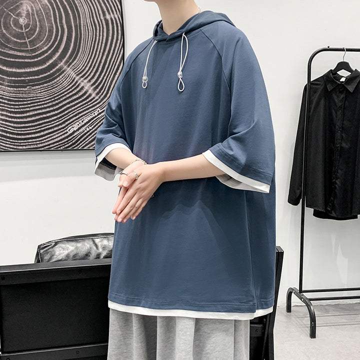 Herren oversize T-shirt med huva och ventilerande egenskaper Mirla-Eva Jonsson
