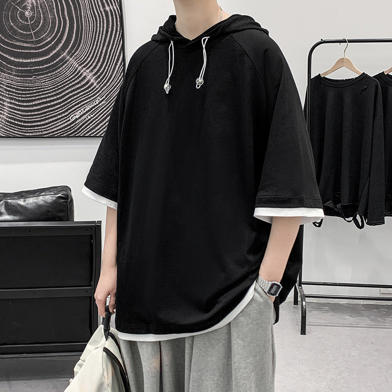 Herren oversize T-shirt med huva och ventilerande egenskaper Mirla-Eva Jonsson