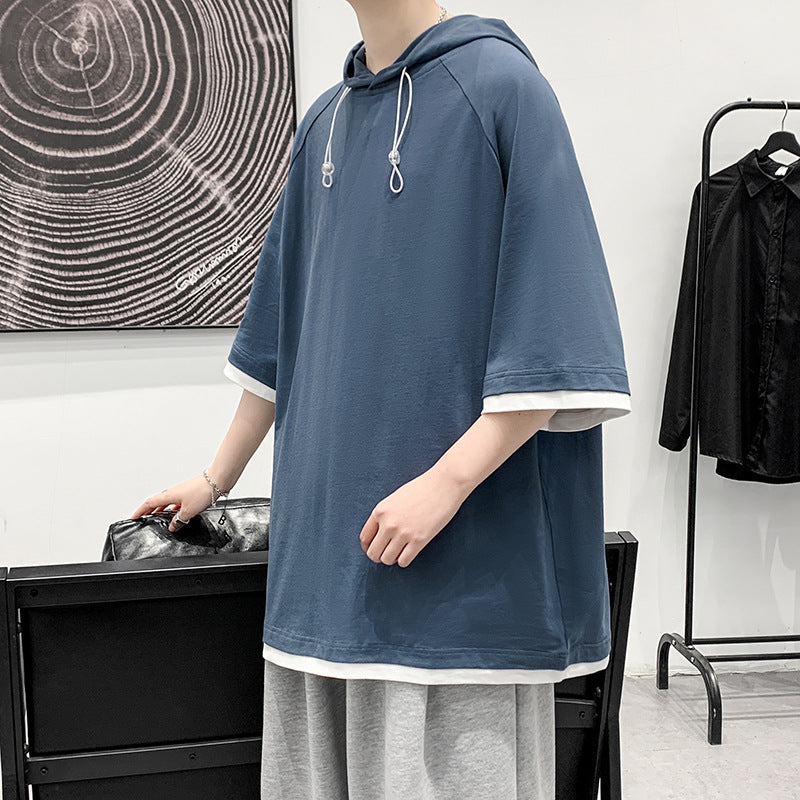 Herren oversize T-shirt med huva och ventilerande egenskaper Mirla-Eva Jonsson