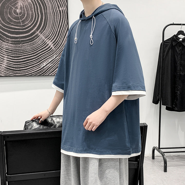 Herren oversize T-shirt med huva och ventilerande egenskaper Mirla-Eva Jonsson