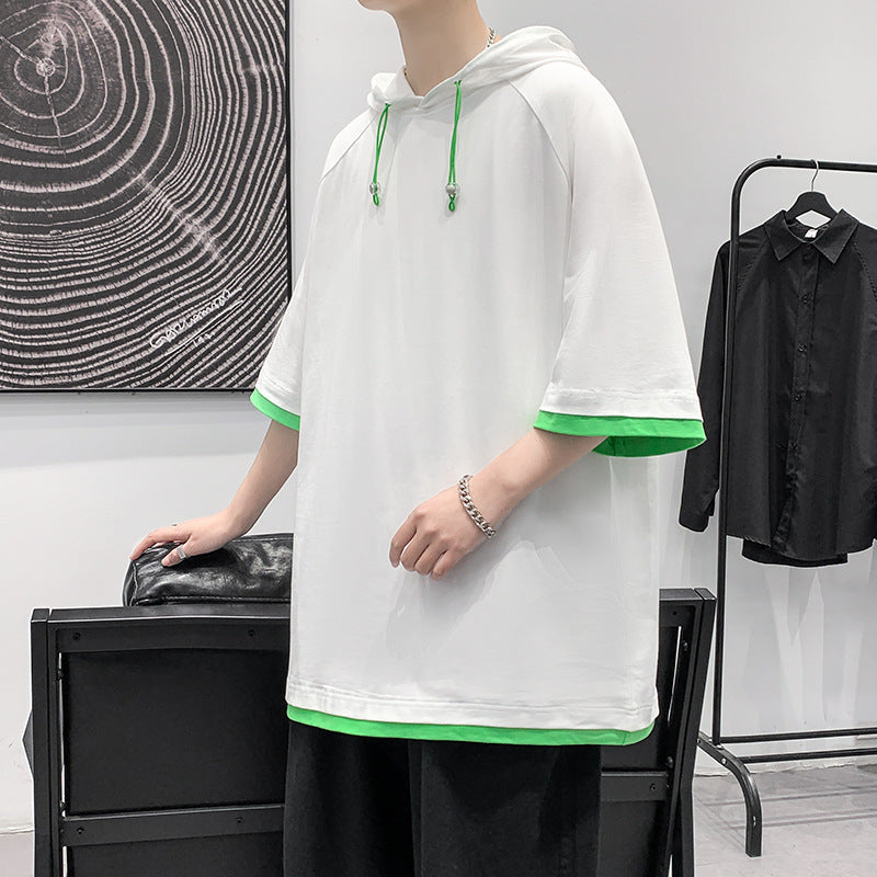 Herren oversize T-shirt med huva och ventilerande egenskaper Mirla-Eva Jonsson