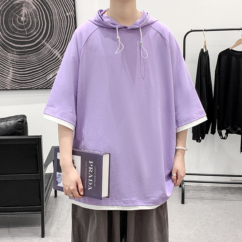Herren oversize T-shirt med huva och ventilerande egenskaper Mirla-Eva Jonsson
