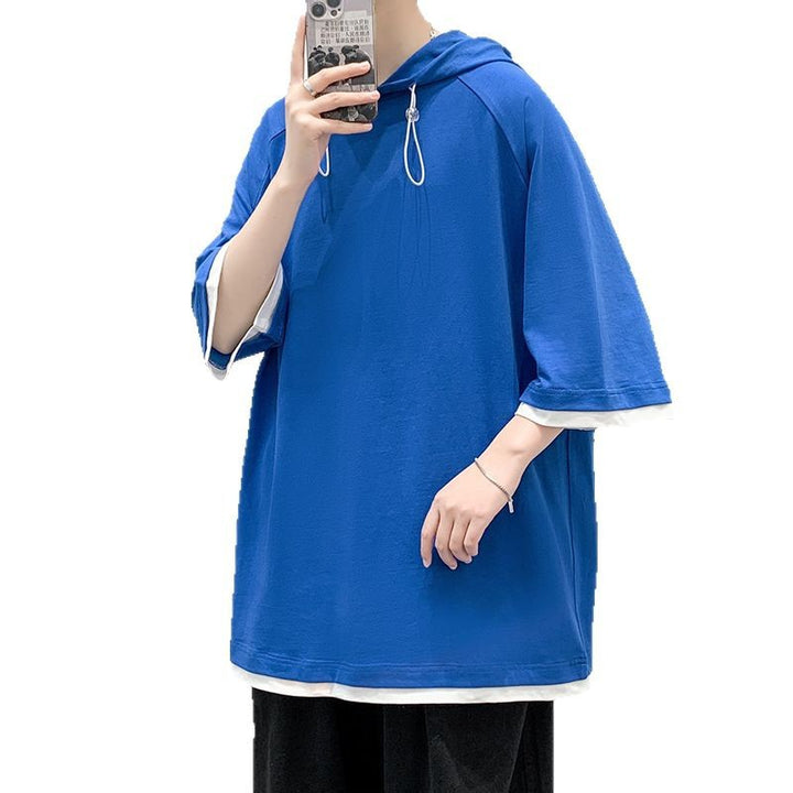 Herren oversize T-shirt med huva och ventilerande egenskaper Mirla-Eva Jonsson
