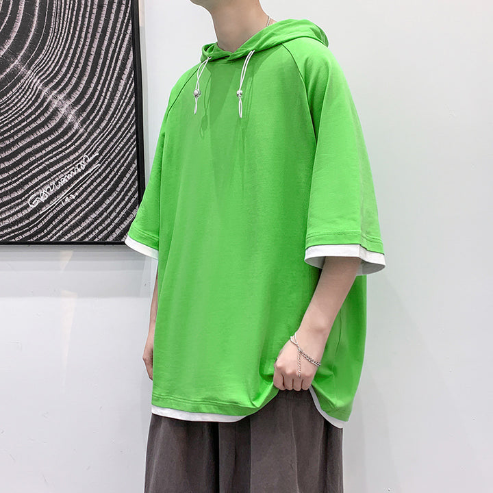 Herren oversize T-shirt med huva och ventilerande egenskaper Mirla-Eva Jonsson