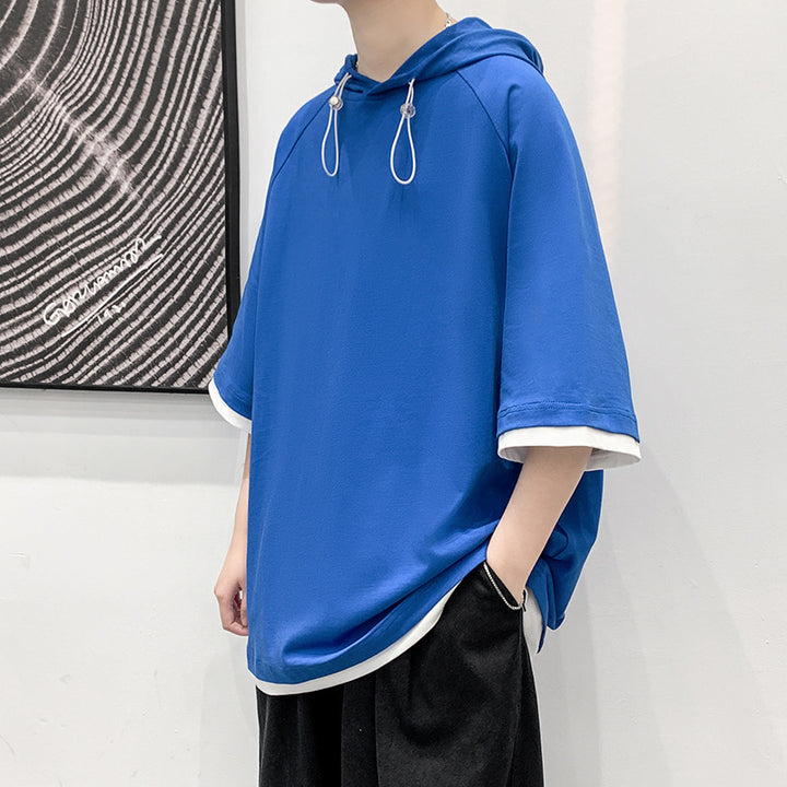 Herren oversize T-shirt med huva och ventilerande egenskaper Mirla-Eva Jonsson