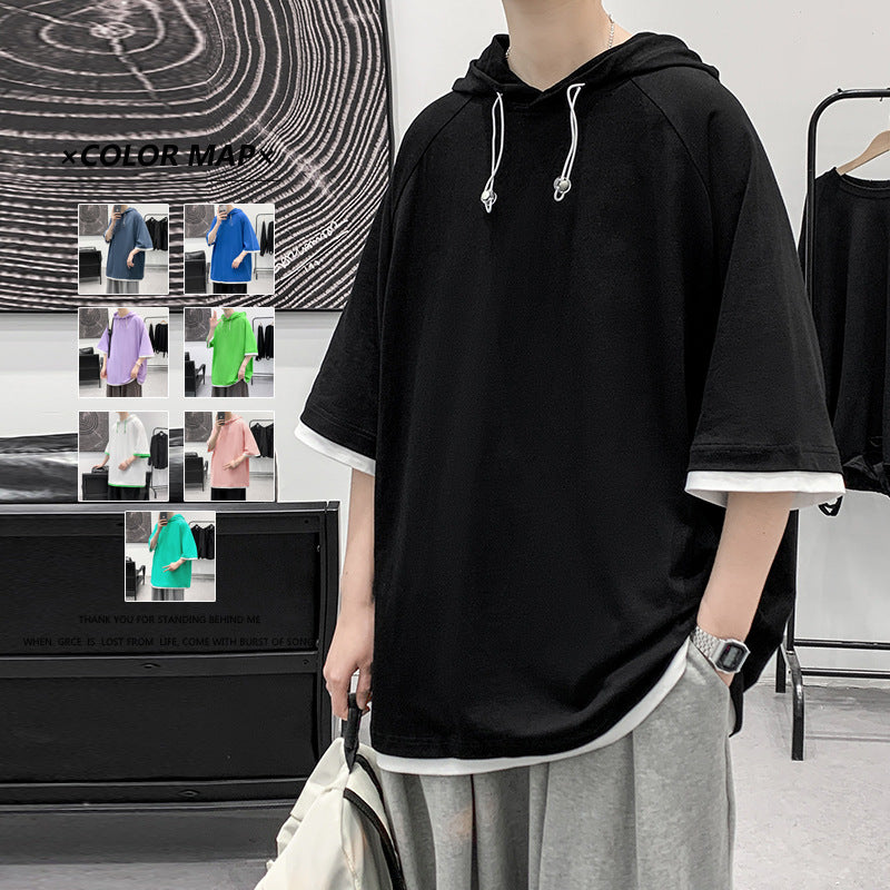 Herren oversize T-shirt med huva och ventilerande egenskaper Mirla-Eva Jonsson