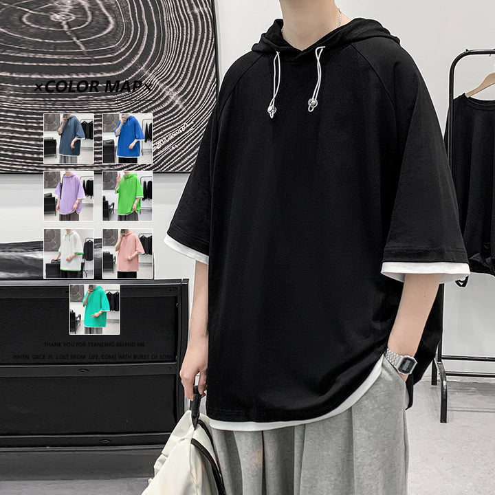 Herren oversize T-shirt med huva och ventilerande egenskaper Mirla-Eva Jonsson