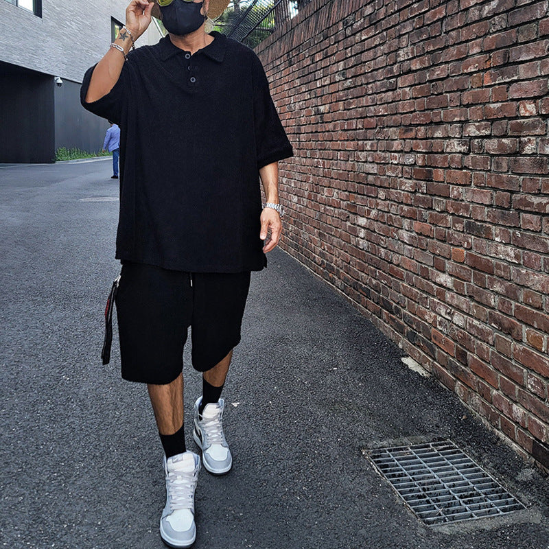 Herren oversized T-shirt och shorts-set med avslappnad design Mirla-Eva Jonsson