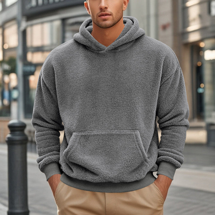 Herren oversized fleece hoodie med känguruficka och bekväm passform Mirla-Eva Jonsson