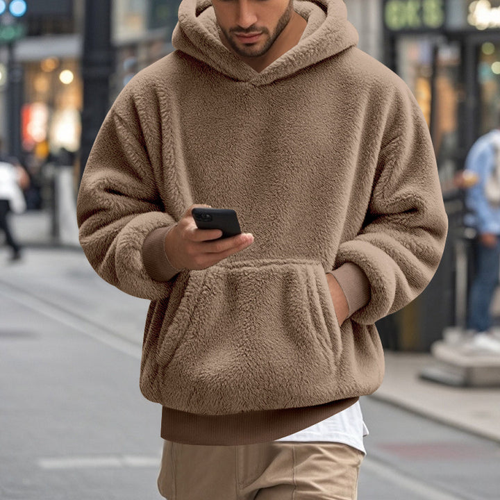 Herren oversized fleece hoodie med känguruficka och bekväm passform Mirla-Eva Jonsson