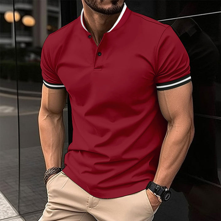 Herren poloshirt med modernt henley-krage och sportiga accenter Mirla-Eva Jonsson