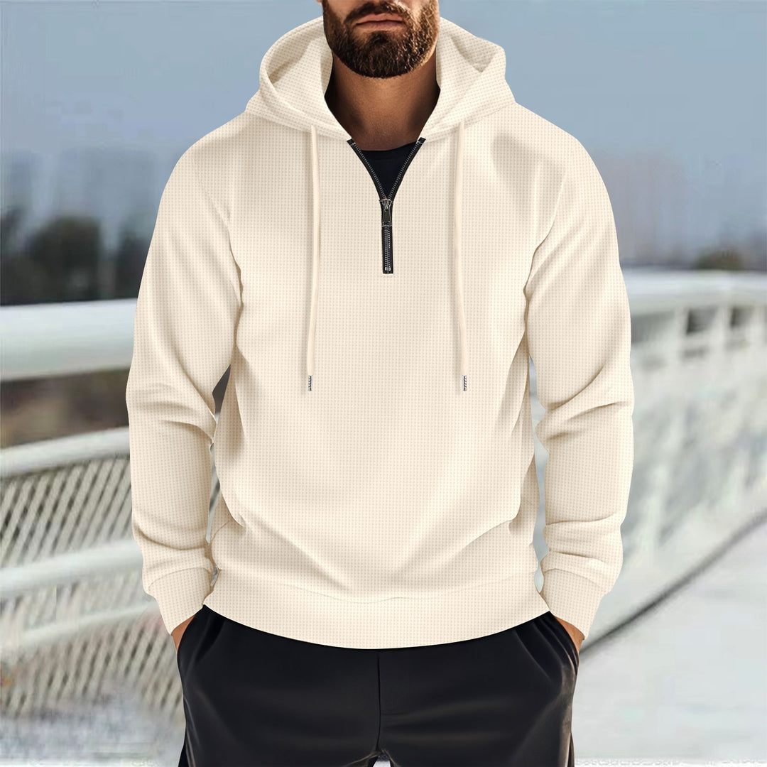 Herren sportig hoodie med halv dragkedja och praktiska fickor Mirla-Eva Jonsson