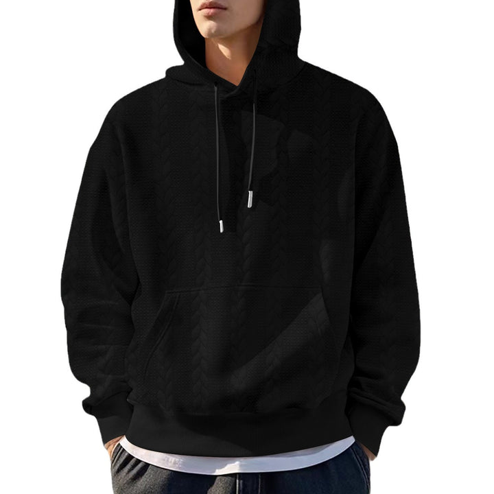 Herrens avslappnad hoodie med praktiska fickor och varmt fleecefoder Mirla-Eva Jonsson
