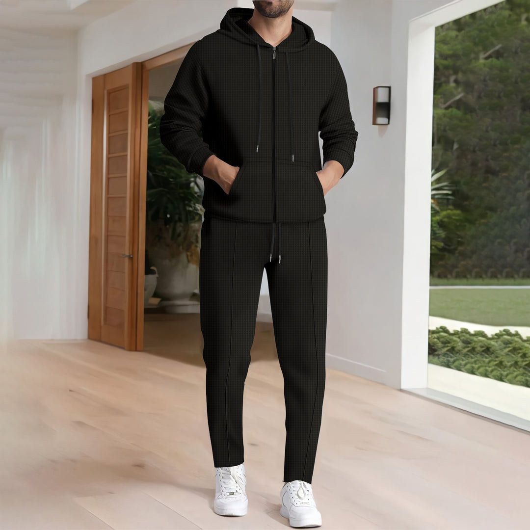 Herrens avslappnad hoodie-set med funktionell design och praktiska fickor Mirla-Eva Jonsson