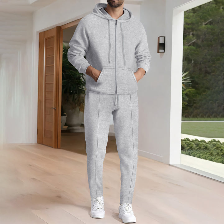 Herrens avslappnad hoodie-set med funktionell design och praktiska fickor Mirla-Eva Jonsson
