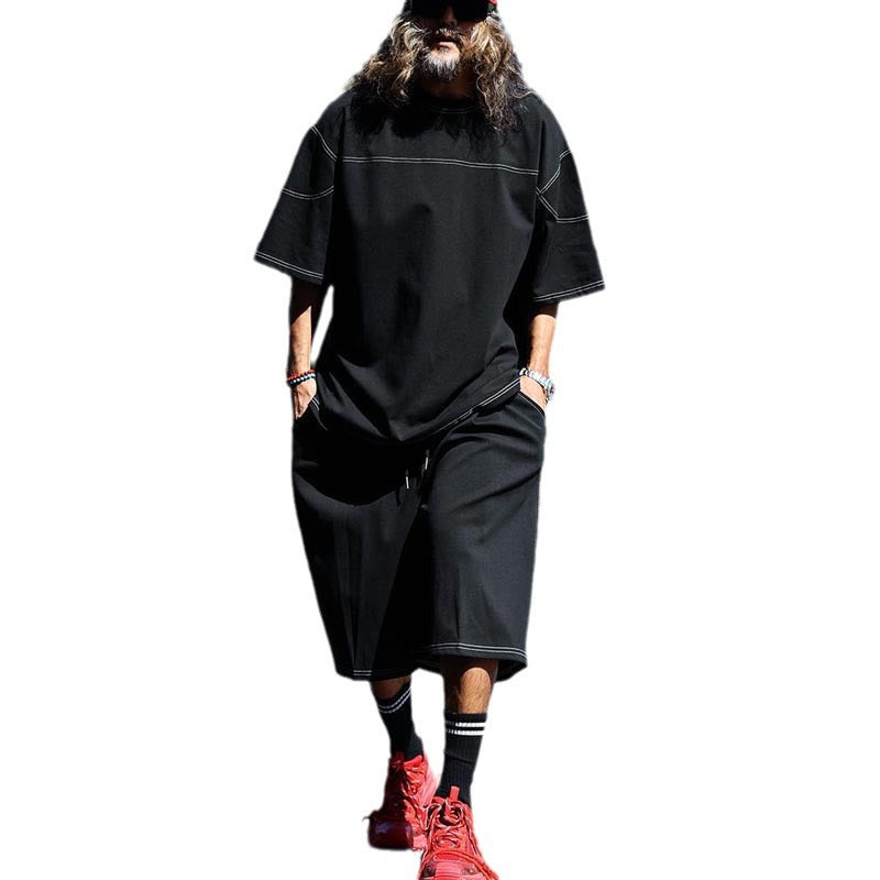 Herrens avslappnad kortärmad T-shirt med oversized passform och bekväma byxor Mirla-Eva Jonsson