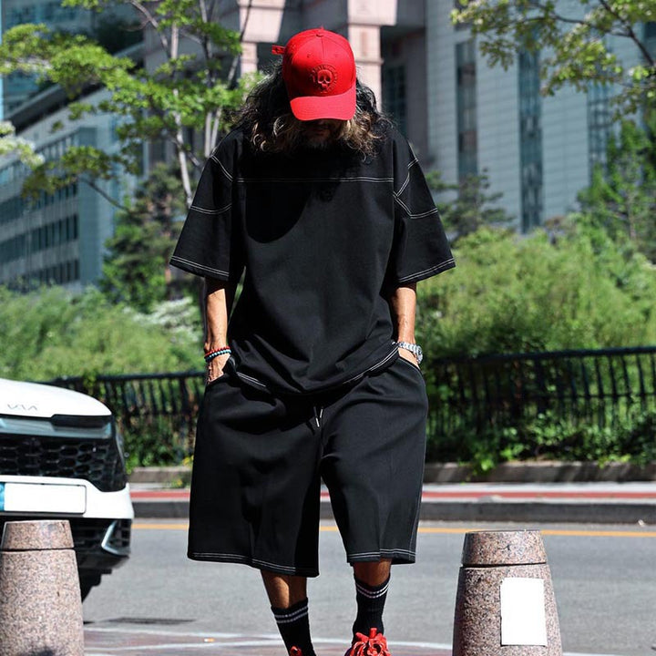 Herrens avslappnad kortärmad T-shirt med oversized passform och bekväma byxor Mirla-Eva Jonsson